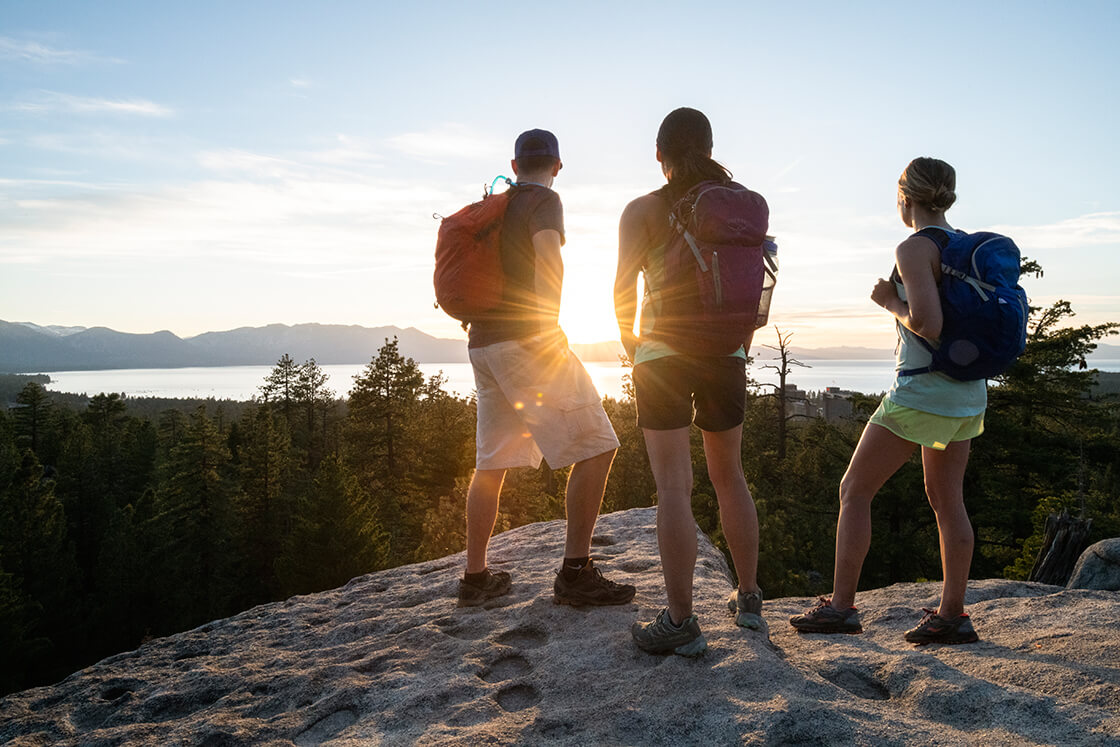 Hikers watching sunset