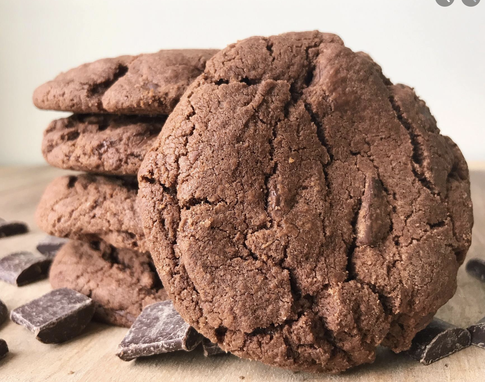 Stack of three cookies with a forth in the foreground