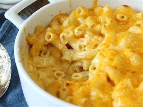 Mac and cheese sitting in a white dish